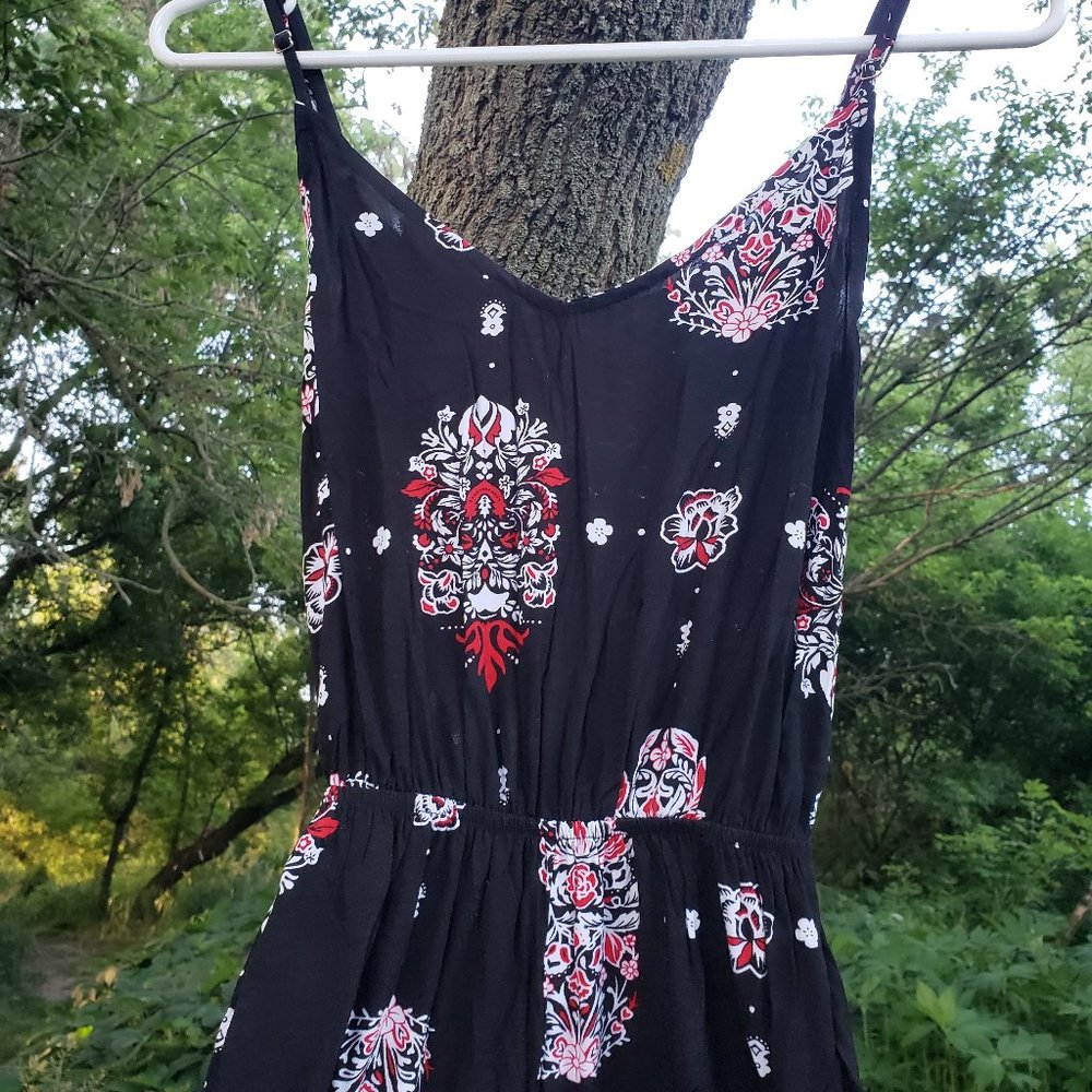 Gorgeous red and black floral jumpsuit. Size small.